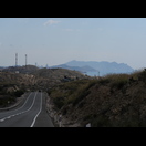 Ein ständiges Auf und Ab entlang der Küste. Im Hintergrund bereits Hochhäuser von Benidorm